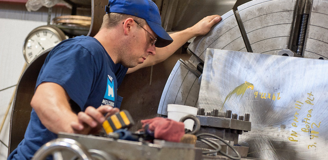 aaron at a large turning machine